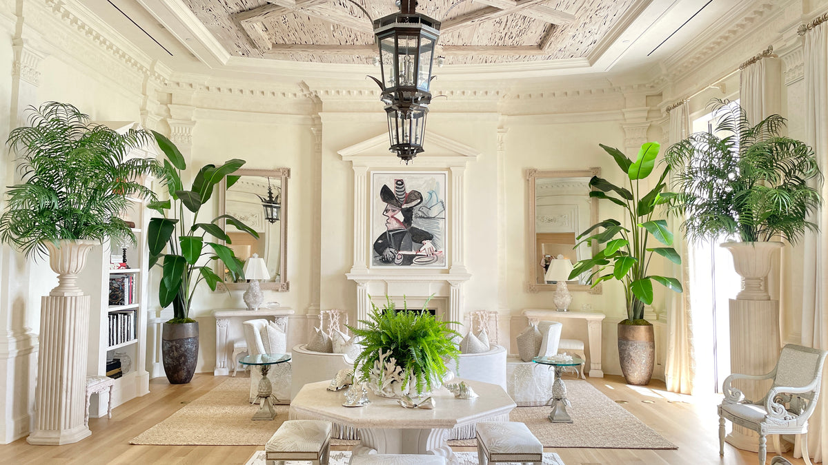 Luxury faux trees designed by Palm Bungalow displayed inside a Palm Beach home