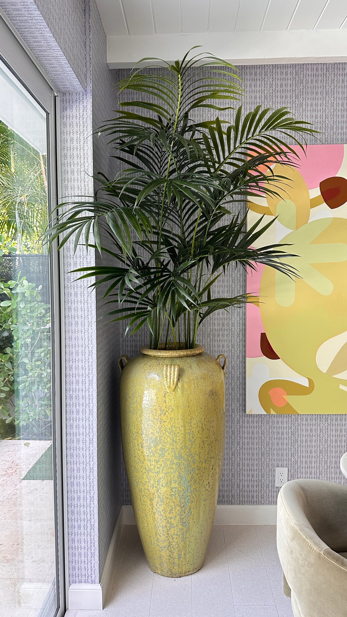 faux kentia palm in palm beach dining room Palm Bungalow